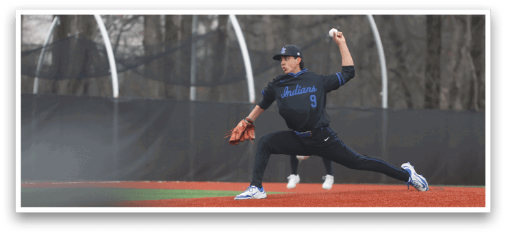 A baseball player in a black shirt and blue hat is throwing a ball on a field. AI generated content
