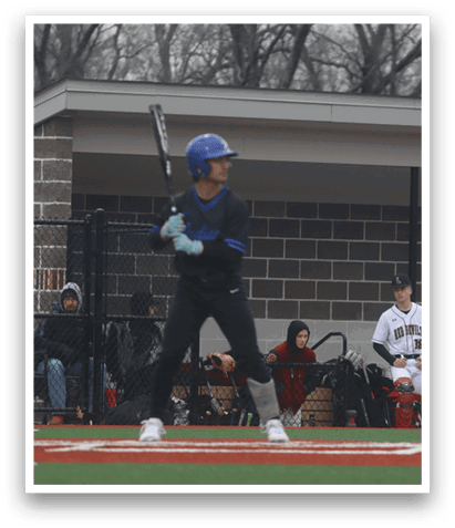 A baseball player in a black shirt and blue helmet is swinging a bat, preparing to hit a ball. AI generated content