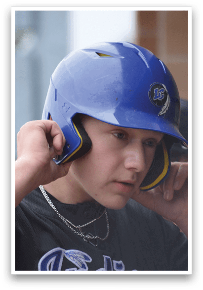A man wearing a blue helmet with yellow ear guards. AI generated content
