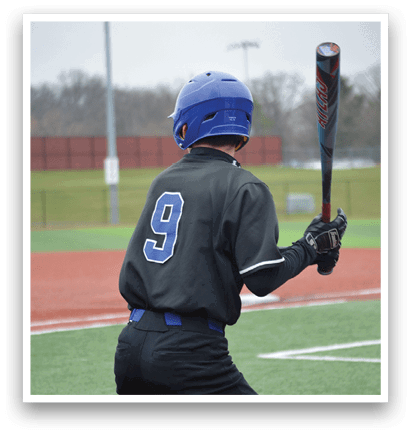 A baseball player in a black shirt and blue helmet is holding a bat, ready to swing. AI generated content