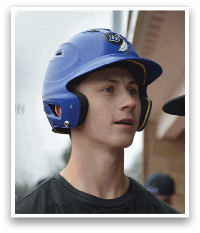 Two young men wearing baseball caps and helmets are standing next to each other. AI generated content