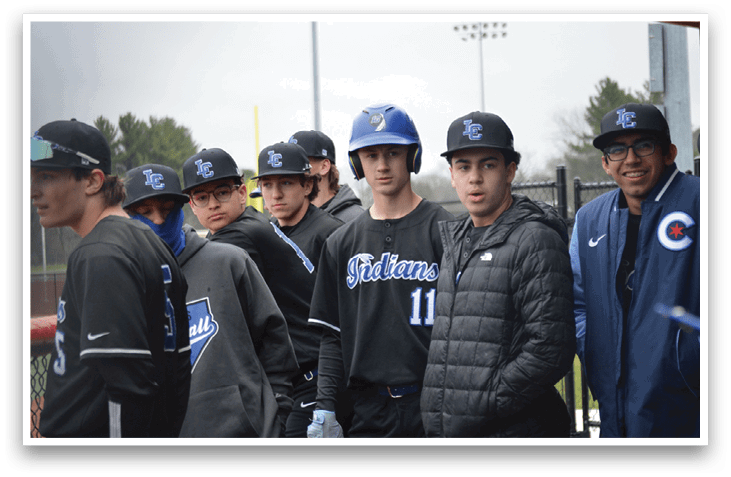 Baseball players wearing blue and black uniforms, some with helmets, standing on a field. AI generated content