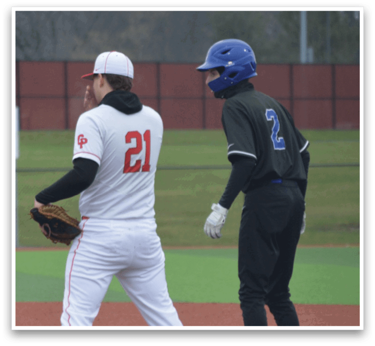 Two baseball players on the field, one wearing a white uniform and the other wearing a black uniform. AI generated content
