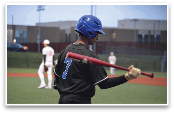A baseball player wearing a blue helmet holds a bat. AI generated content