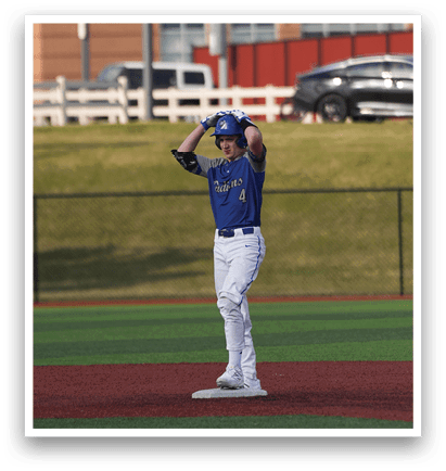 A baseball player stands on the field, wearing a blue uniform and a blue helmet. AI generated content