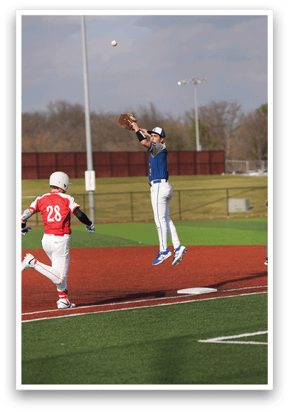 A baseball player jumps in the air to catch a ball. AI generated content