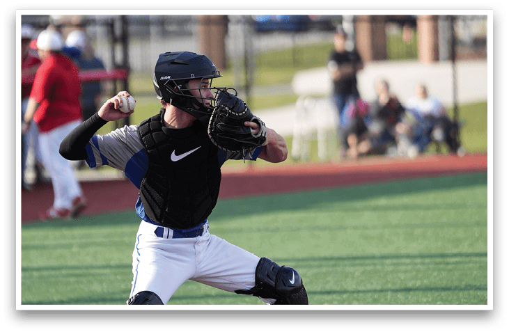 A baseball player in a black helmet and blue and white uniform is holding a baseball bat, preparing to swing. AI generated content