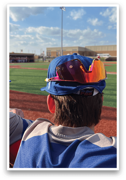 A man wearing sunglasses on top of his head. AI generated content