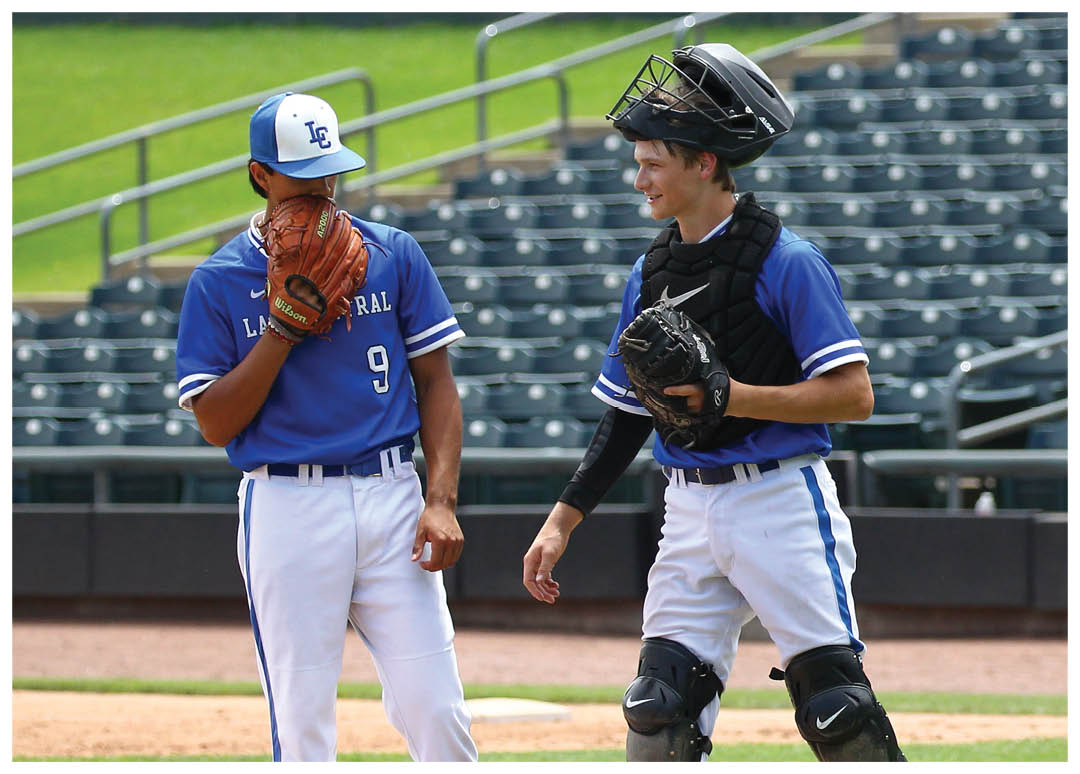 A group of baseball players celebrating a win. Description generated by AI