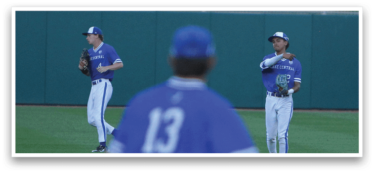 A baseball player sliding into a base. Description generated by AI