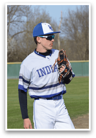 A baseball player wearing a blue and white uniform is holding a catcher's mitt. AI generated content