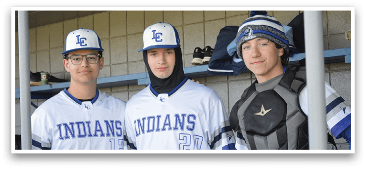 Three baseball players wearing blue and white uniforms pose for a picture. AI generated content