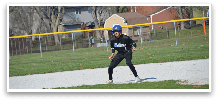 A person wearing a blue helmet and black uniform is playing baseball on a field. AI generated content