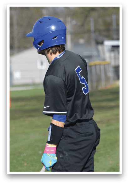 A baseball player wearing a blue helmet and black shirt. AI generated content