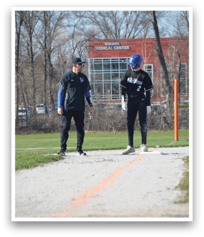 Two men are standing on a baseball field, one of them wearing a blue hat. AI generated content