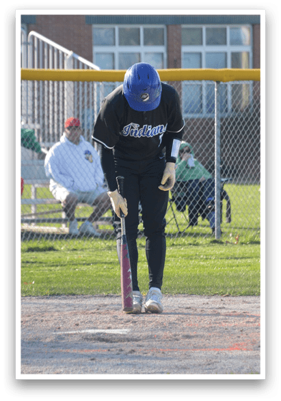A baseball player is holding a bat and standing at home plate, ready to hit the ball. AI generated content
