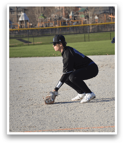 A baseball player is kneeling on the ground, holding a baseball glove, ready to catch the ball. AI generated content