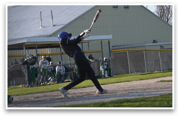 A baseball player in a black shirt and blue helmet is swinging a bat at a ball. AI generated content