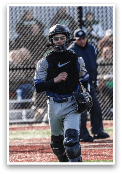 A baseball player wearing a helmet and a catcher's mitt walks on the field. AI generated content