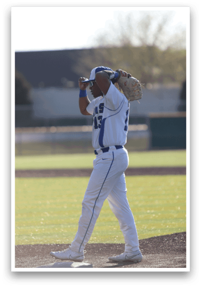 A baseball player is holding a bat, preparing to swing. AI generated content