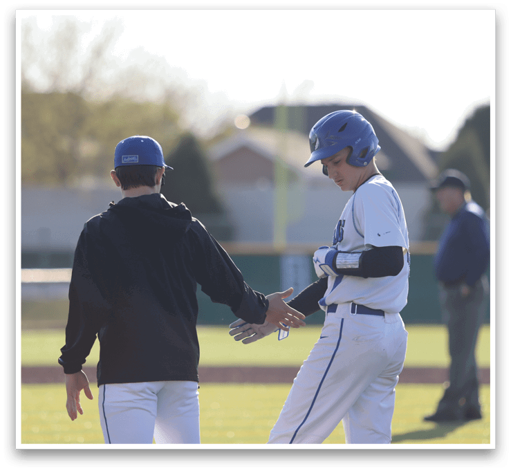 Two baseball players shake hands on the field. AI generated content