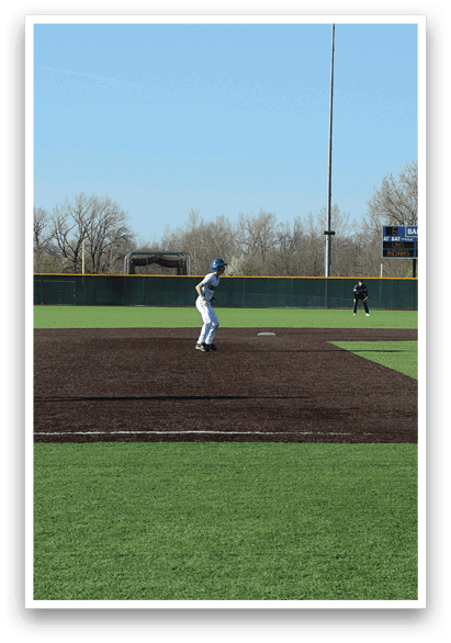 Two baseball players are on the field, one is holding a bat and the other is wearing a baseball glove. AI generated content