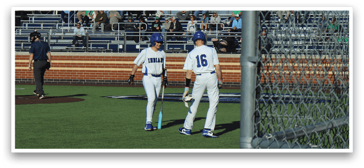 Three baseball players are standing on a field, wearing white uniforms. They are positioned in the outfield, with one player closer to the left side, another in the middle, and the third on the right side of the field. A crowd of spectators is watching the game from the stands, with some sitting closer to the field and others further away. The scene captures the excitement of a baseball game as the players prepare for the next play. AI generated content