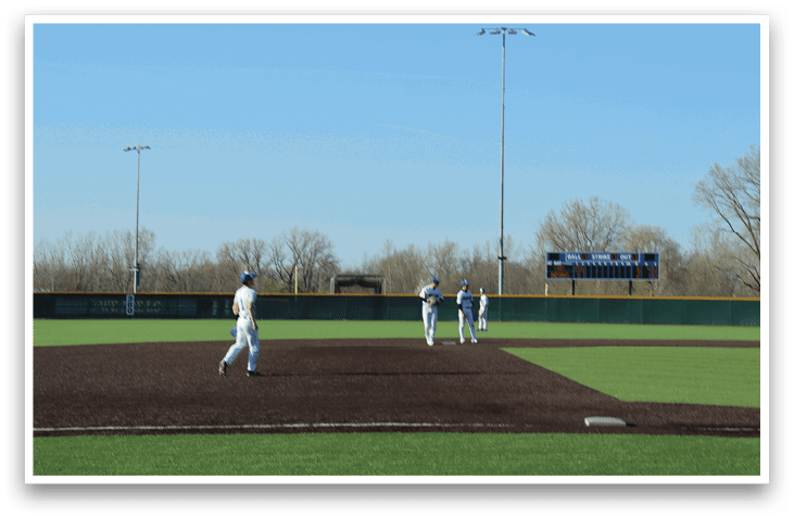 Two baseball players are on a field, one is running towards the other. AI generated content