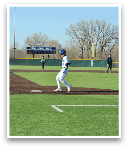 A baseball player is standing on the field with his bat, ready to hit the ball. AI generated content