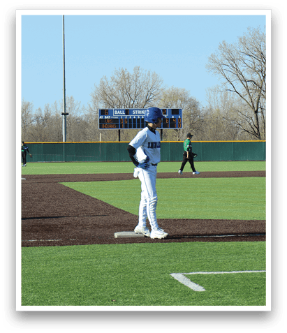A baseball player is standing on the field, holding a bat, and waiting for the pitch. AI generated content