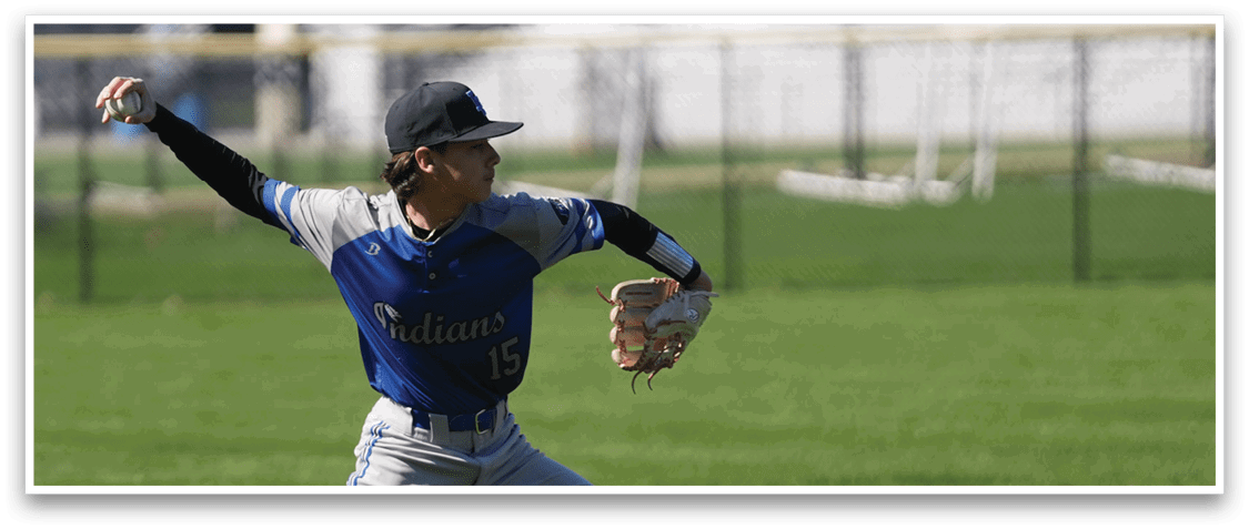 A baseball player in a blue and grey uniform is throwing a ball on a field. AI generated content