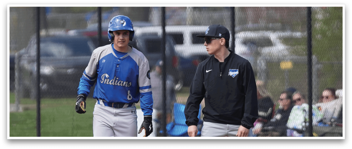 Two men are standing on a baseball field, one of them wearing a blue helmet. AI generated content