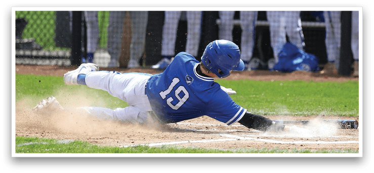 A baseball player slides into home plate, wearing a blue and white uniform. AI generated content