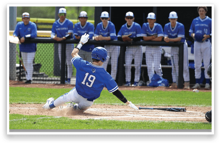 A baseball player slides into home plate, with his teammates watching from the dugout. AI generated content