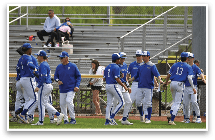 Baseball players wearing blue uniforms and blue caps are walking on a field. AI generated content