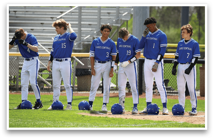 Baseball players wearing blue uniforms and blue helmets. AI generated content