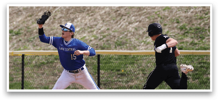 A baseball player in a blue and white uniform is throwing a ball. Another player in a black uniform is running to the base. AI generated content
