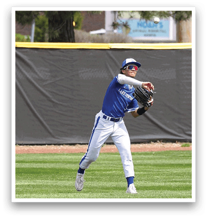 A baseball player in a blue uniform is catching a ball. AI generated content