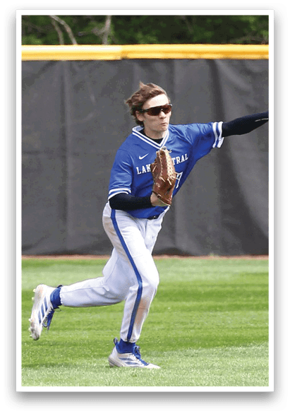 A baseball player wearing a blue shirt and white pants is running towards a ball. AI generated content