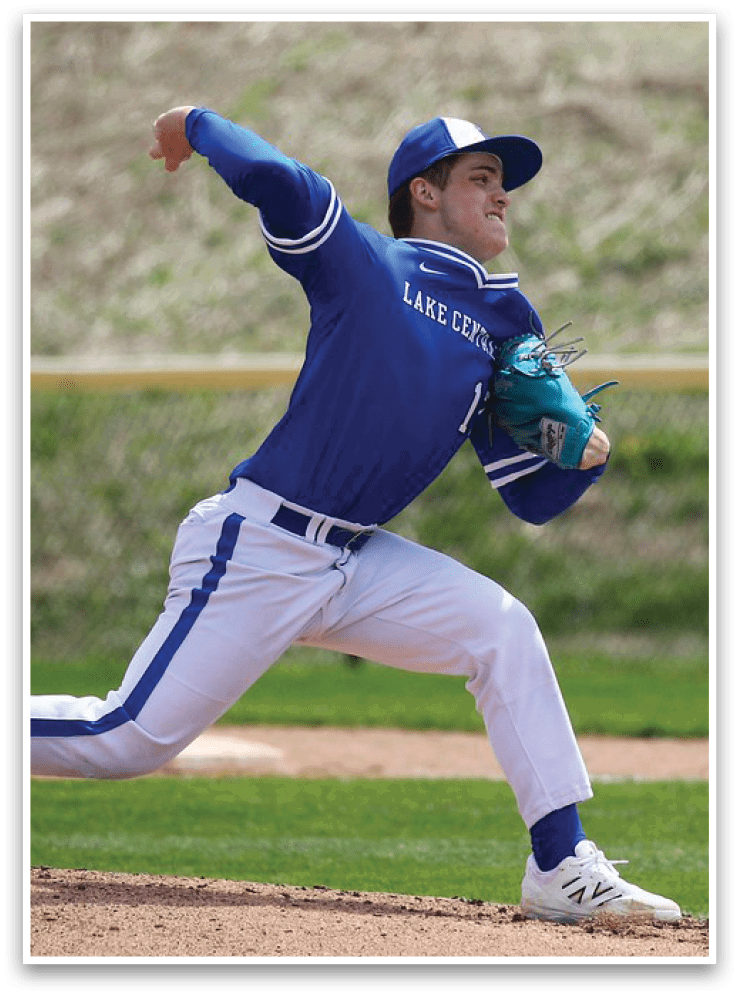 A baseball player in a blue uniform is pitching a ball on a field. AI generated content