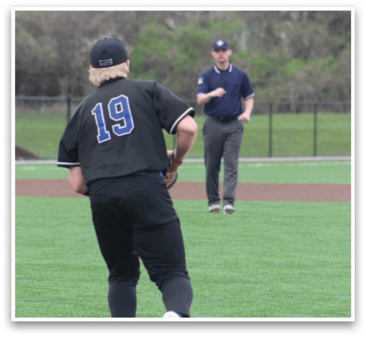 A baseball player wearing a black jersey with the number 19 is running towards a base. AI generated content