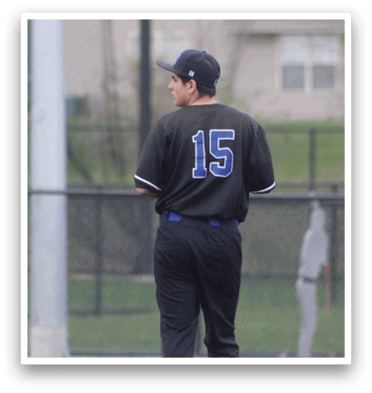 A man wearing a baseball uniform with the number 15 stands on a field. AI generated content