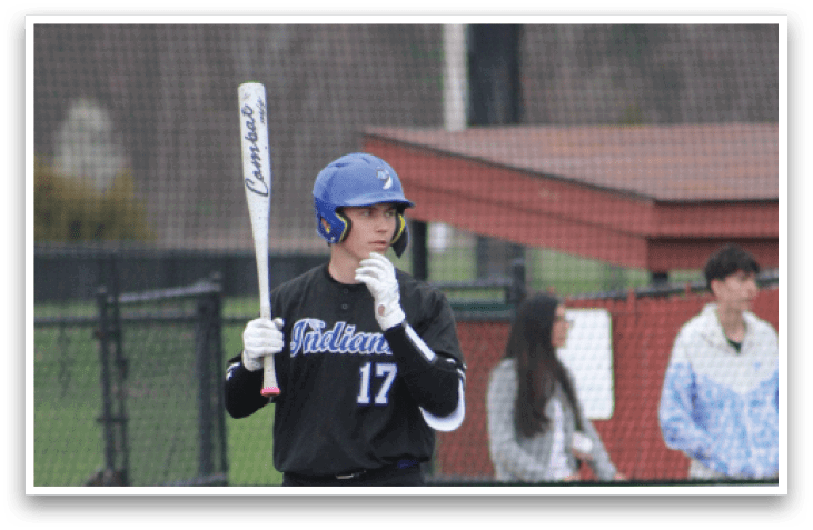 A baseball player in a black uniform is holding a bat and getting ready to swing. AI generated content