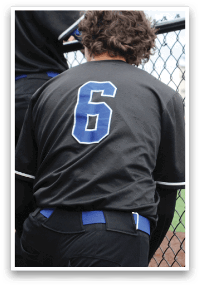 A baseball player wearing a black jersey with the number 6 on it. AI generated content