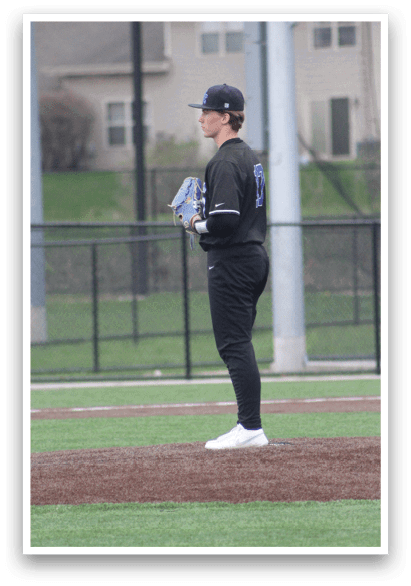 A baseball player is standing on the field, holding a baseball bat. AI generated content