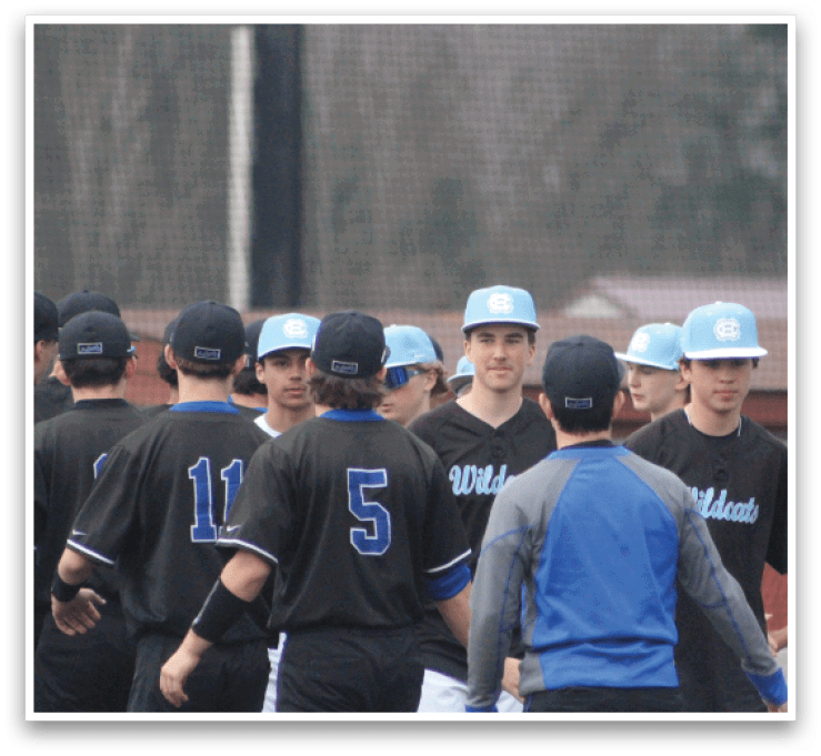 A group of baseball players wearing blue hats and black jerseys are standing on a field. AI generated content