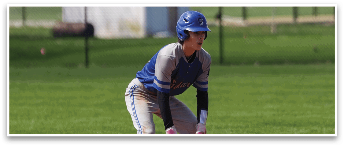 A baseball player is crouched on the field, wearing a blue helmet and a grey uniform. AI generated content