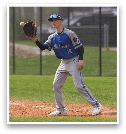 A baseball player in a blue and white uniform is holding a baseball glove and standing on the field. AI generated content
