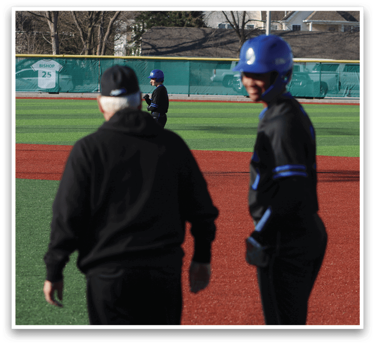 Two men are standing on a baseball field, one wearing a blue helmet. AI generated content