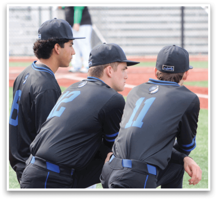 Three baseball players wearing black uniforms and blue numbers on their backs are sitting on the ground. AI generated content